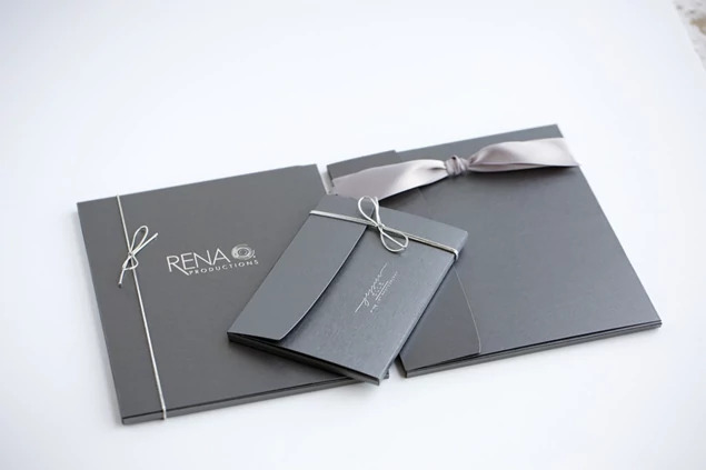 Silver Tyndell Stribbon 10", 19", 28" on slate gray photo case.