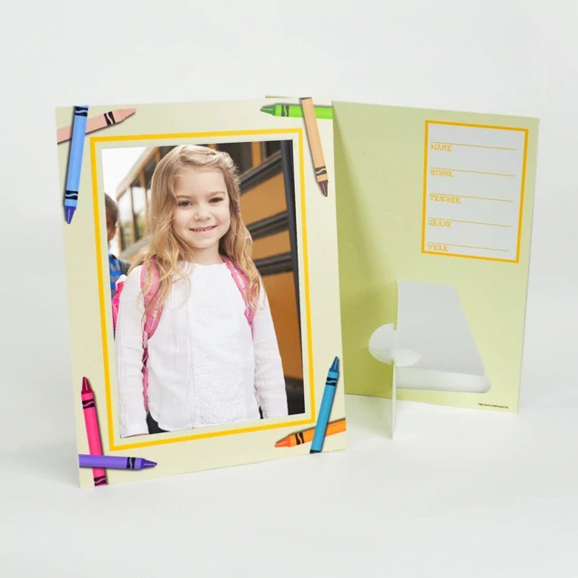 Crayon Panel Mount standing upright with girl school portrait showing pop-out easel and autograph area