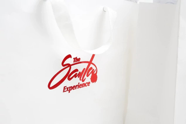 Tyndell White Euro Tote in 16x12 showing reinforced bottom and cotton twill ribbon handles for large format delivery